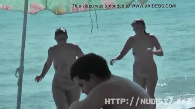 Public nudity scene with naked sexy nudist brunette